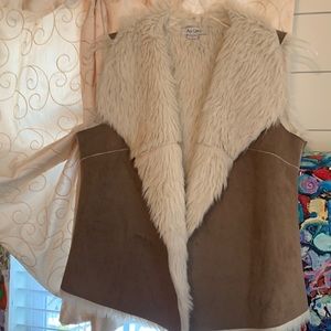 Reversible vest, good condition.